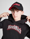 Person wearing a black 'Hood Rich' hoodie and pants with a red logo on a white background