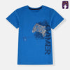 Child wearing a blue t-shirt with a graphic design on a plain background