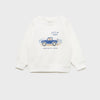 Child wearing a white sweatshirt with a blue truck graphic and text on a gray background